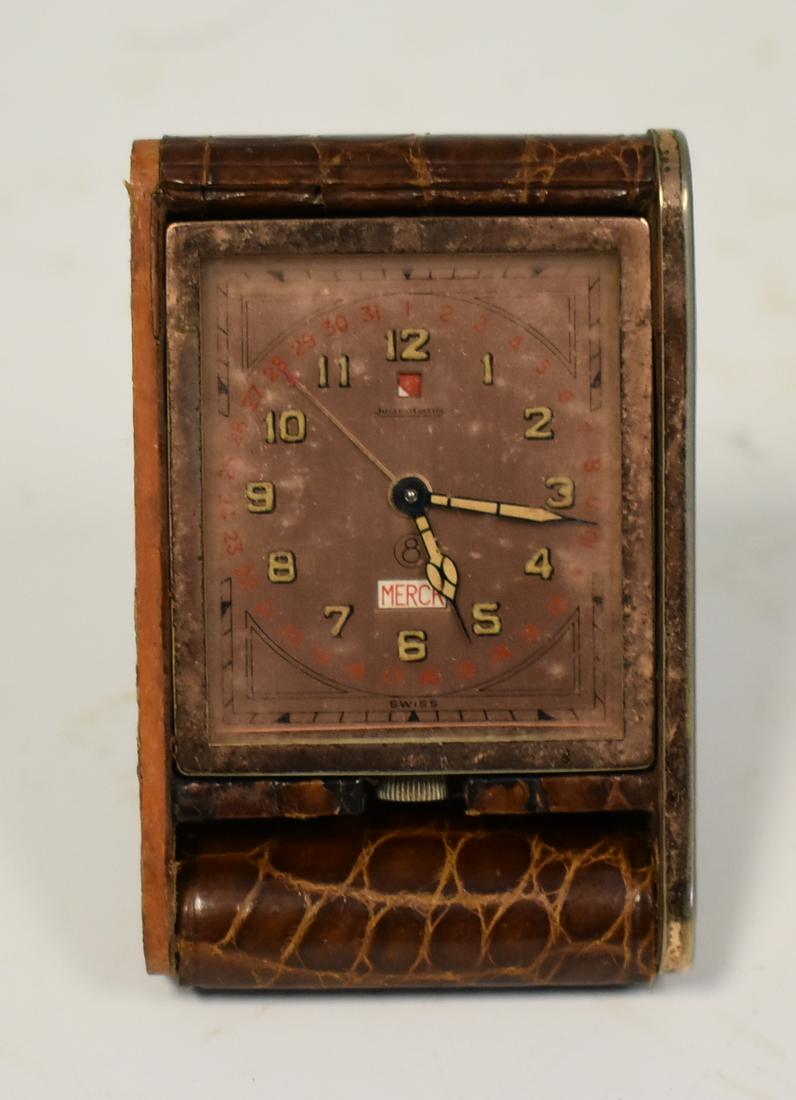 Jaeger LeCoultre Leather Pocket watch: Some wear. 3 inches when closed.
