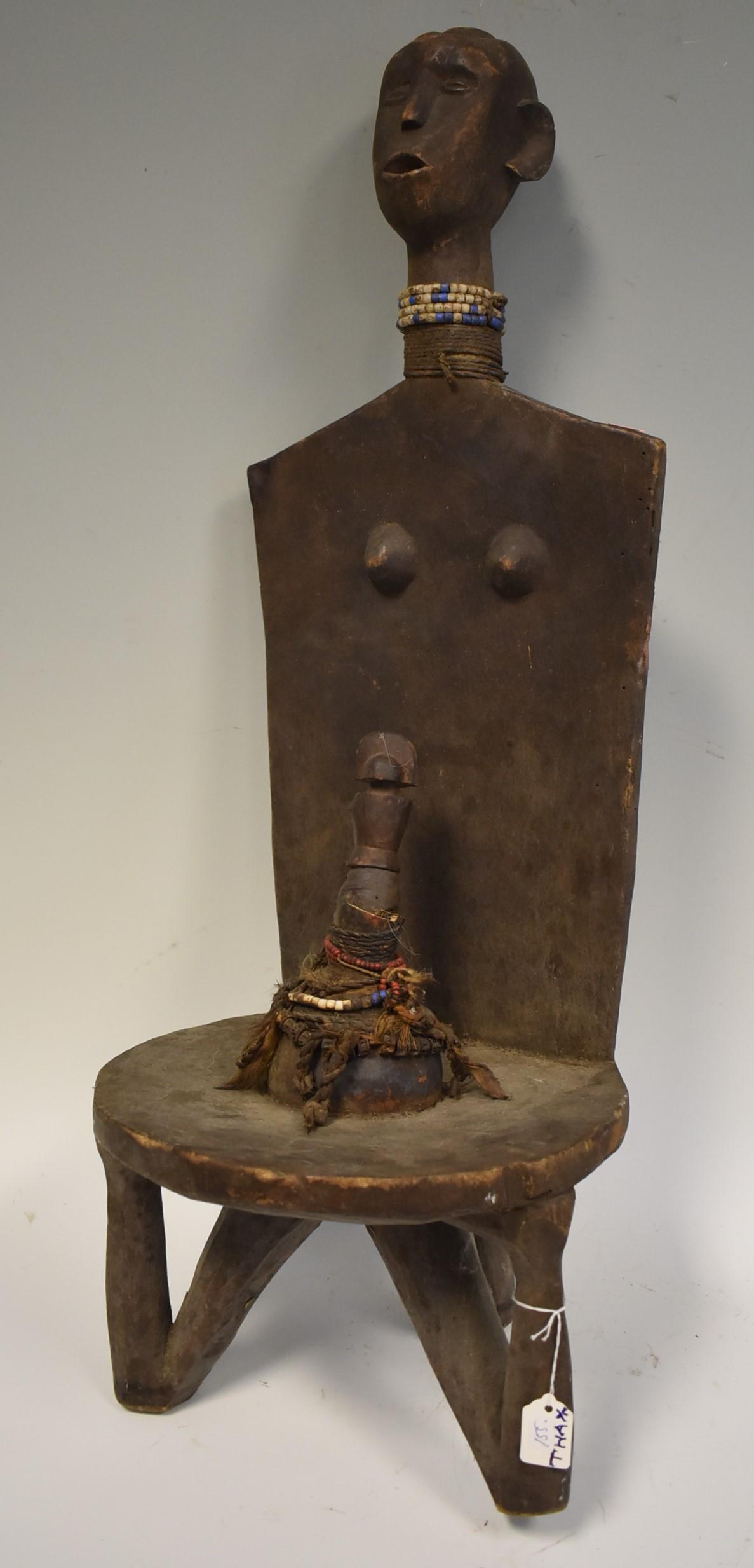 Unique African Carved Stool: 31 inches.