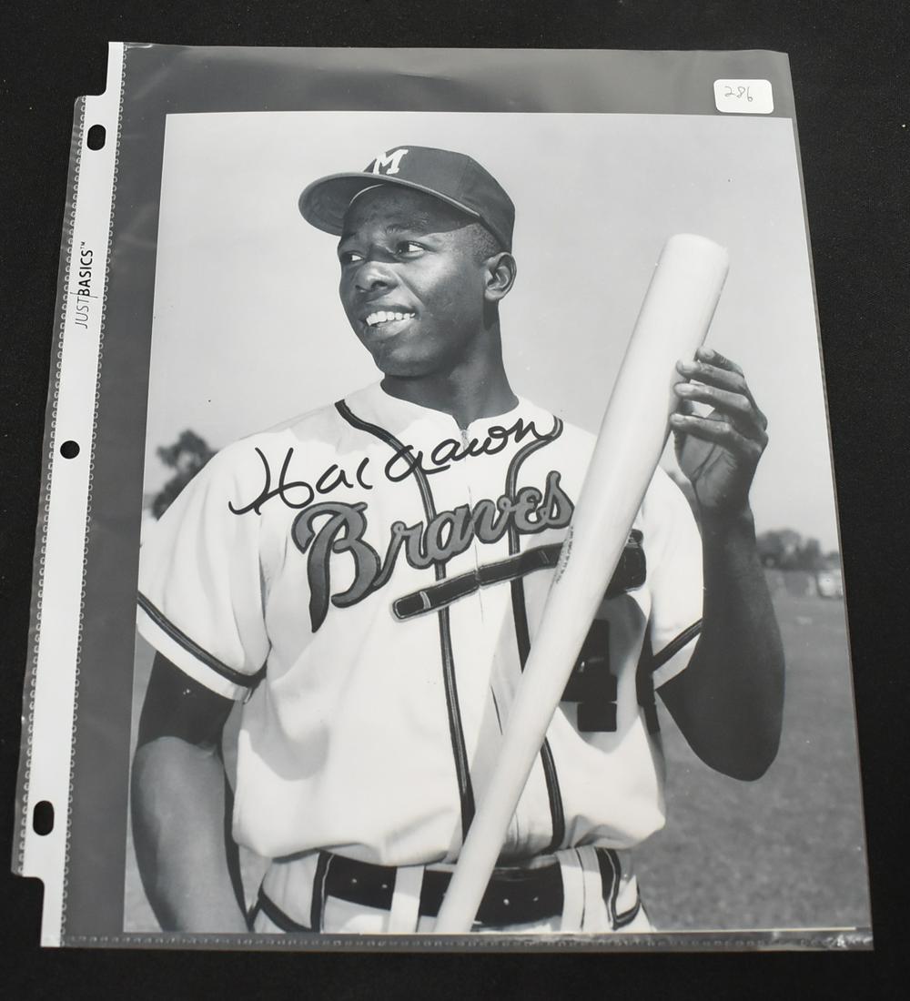 Sgd. Hank Aaron Photo: B & W. Includes authentication. 8 inch x 10 inch.