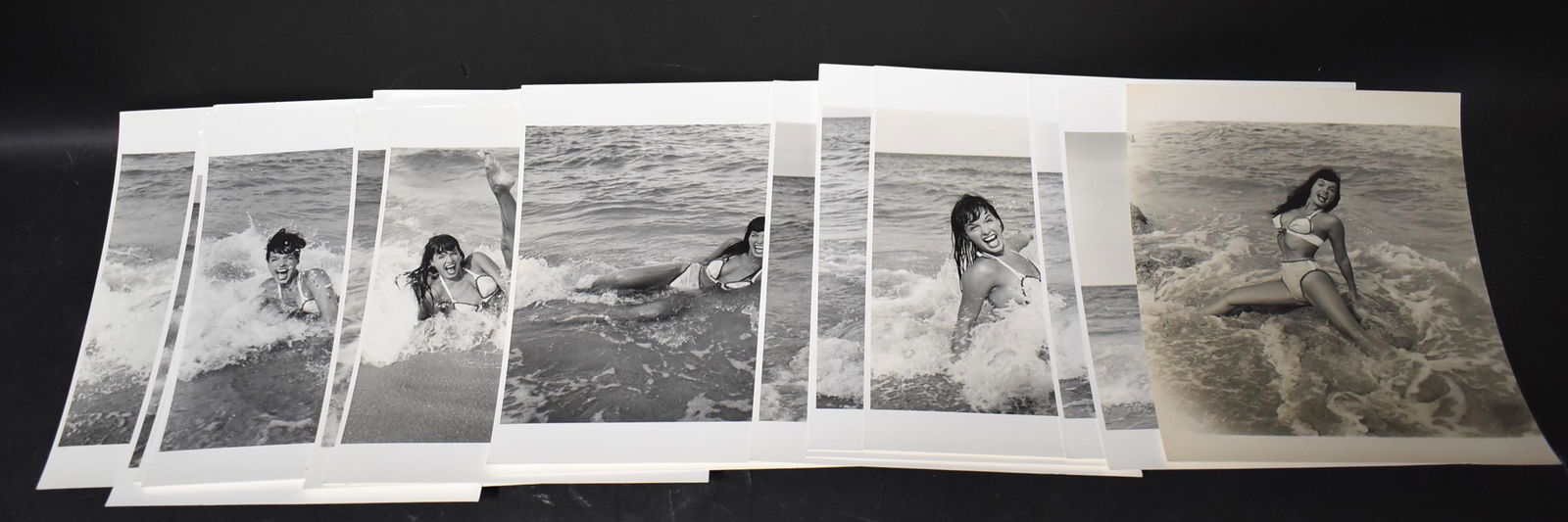 Bettie Page Era Eric Kroll Photos: (19) 8x10 Double Stock All Stamped on Back Bunny Yeager Represented by Eric Kroll Bikini Photos On Beach (1) photo in Lot Not Stamped