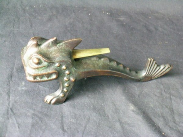 GERMAN BRONZE AND BRASS LIGHTER: sea creature form, marked Made in Germany