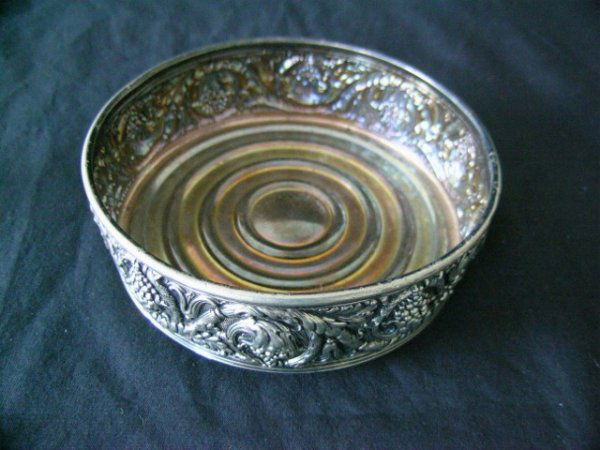 FANCY TIFFANY WINE BOTTLE COASTER: Intricate grape design. Marked Tiffany & Co. Makers #'d 9240 EPS (Electroplated Silver) 5" W.