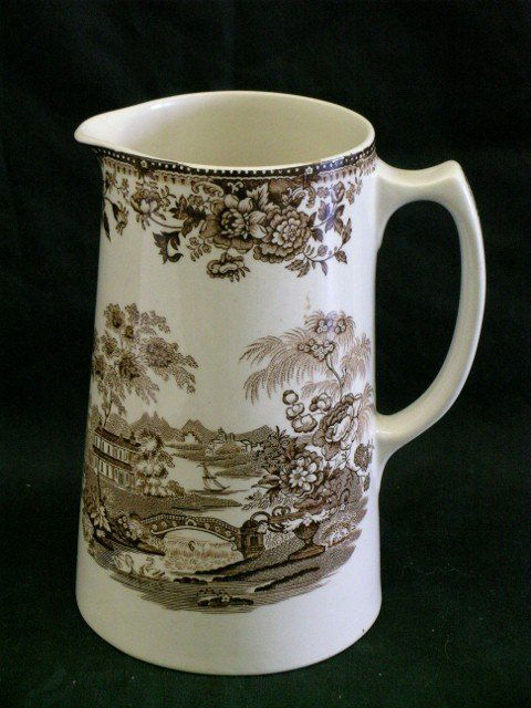 CLARICE CLIFF PITCHER: Tonquin Royal Staffordhire brown & white pitcher by Clarise Cliff. 8" h