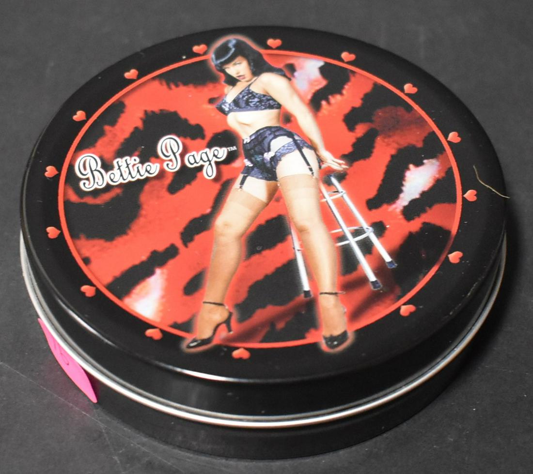 Bettie Page Set of Coasters in Tin: Set of four pin up coasters (never opened). Still in shrink wrap. Pin Ups in a Pin Up decorated tin