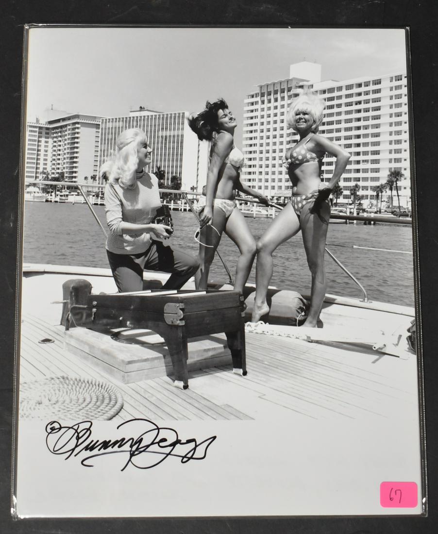 Sgd. Bunny Yeager Group Photo: Sgd BY in sharpie. Other models unknown. 10 x 8.