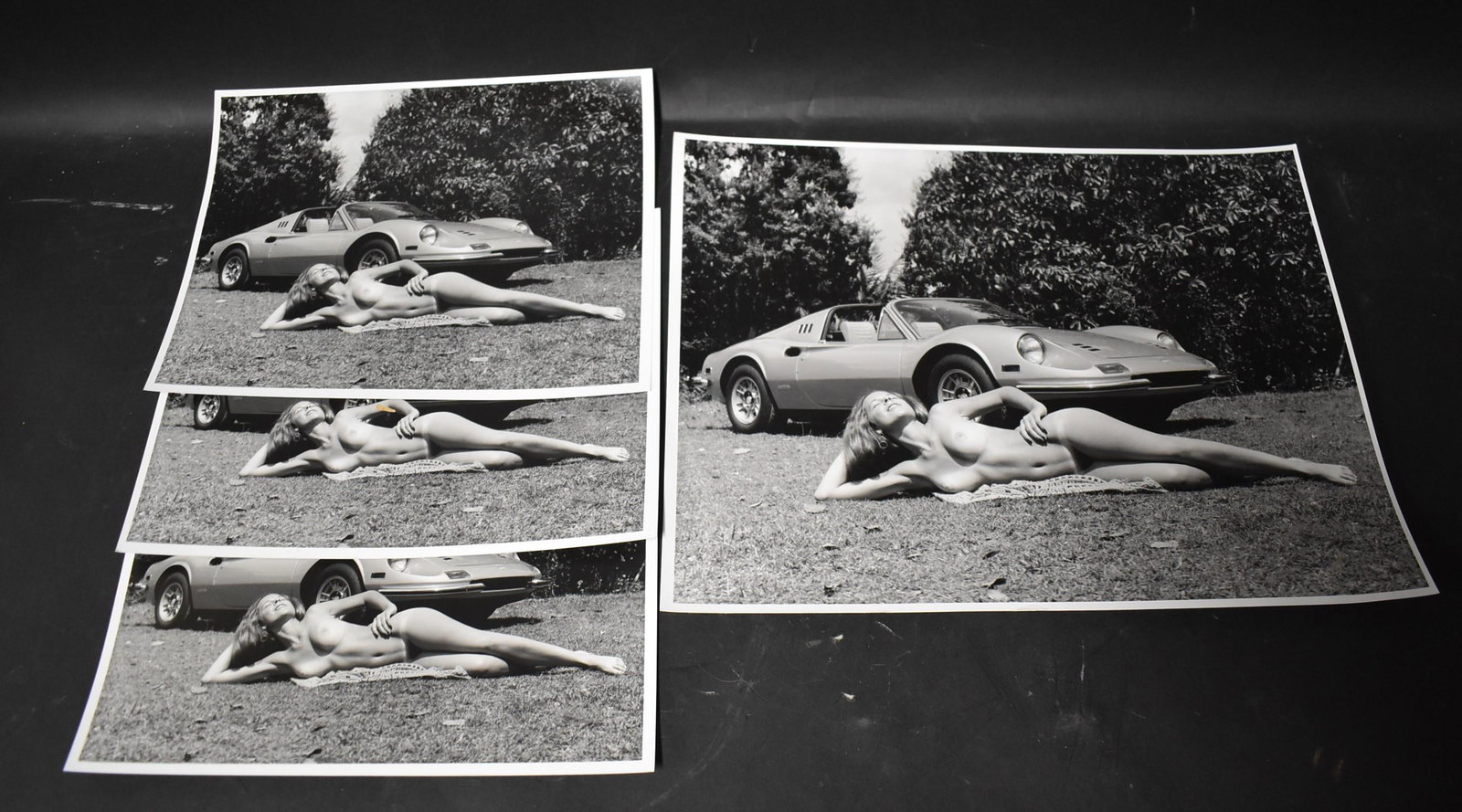Model KiKi Kaiser Photographs (4): (4) 8x10 Double Stock. Laying In Front Of Sports Car & (1) 11x14 Double Stock Photo Same Subject. 1973