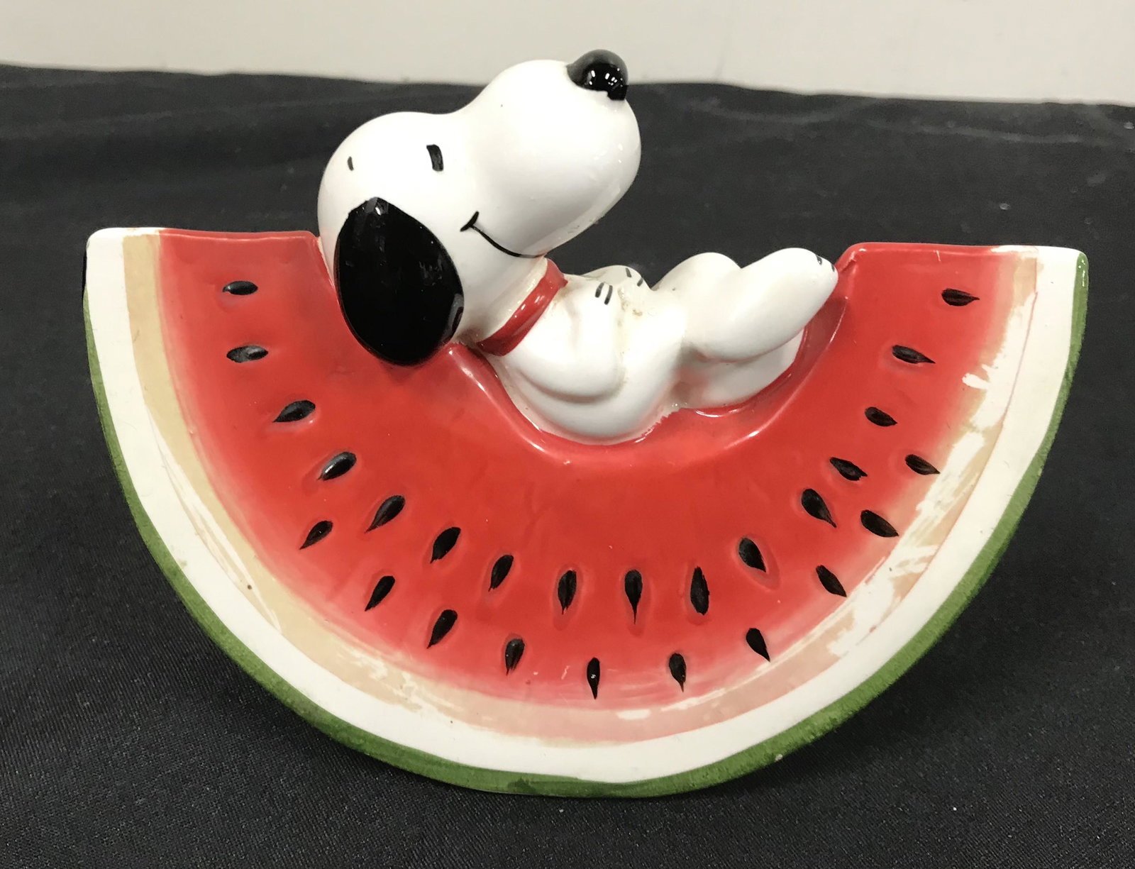 Snoopy on a Watermelon Bank: 6 inches.
