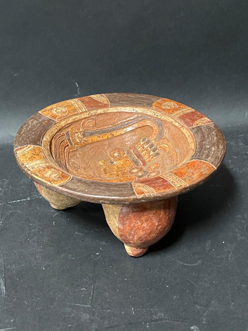 Pre-Columbian Pottery Dish: Pottery footed dish. Bas relief decorated interior with Mayan figure; 3.5in. X 7in.