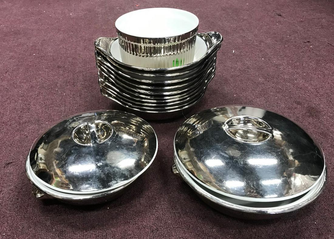 Royal Worcestor Chromed Dinnerware (12): 10 plates, and 2 covered dishes. Damage to one of the bowl will be seen in pictures.