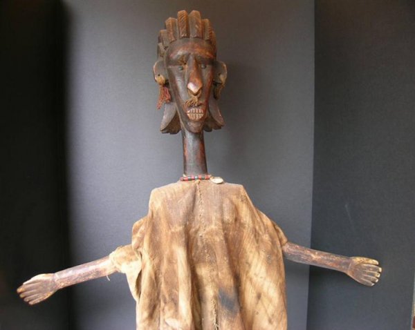 AFRICAN PUPPET: Bambara, Mali (Bamana) Female puppet with retractable arms used to tell stories and satirize conventional customs; 28 in. H.
