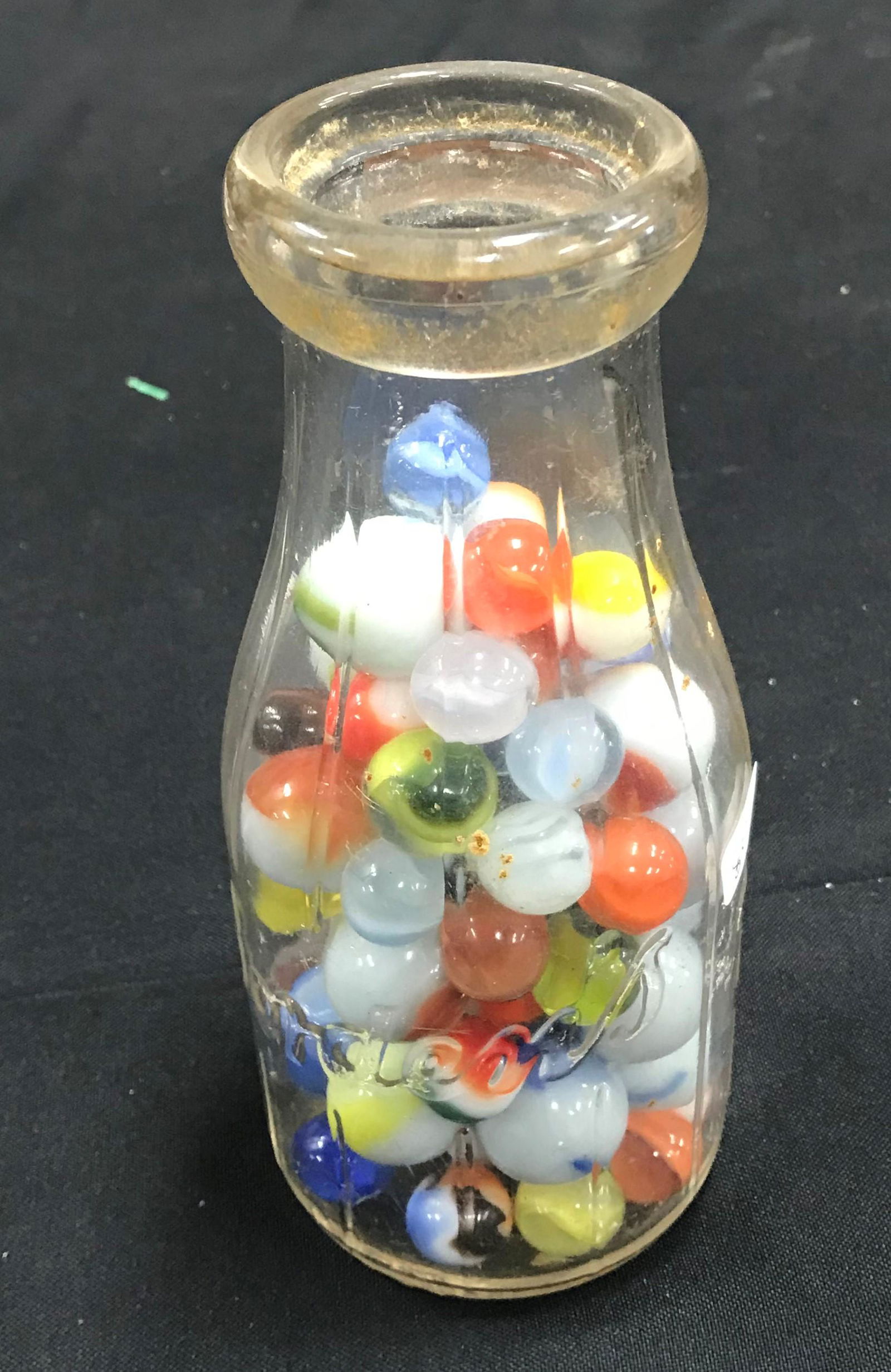 Antique Marbles inc. Swirls: Housed in an antique Borden's milk bottle