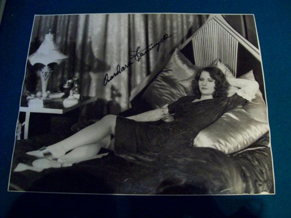 ELMER FRYER AUTOGRAPHED BARBARA STANWYCK: 10 3/4" W X 13 3/4" H, double weight, glossy, (Jan. 1931) Publicity Snipe on verso, Elmer Fryer back stamp, Personality portrait by Elmer Fryer First National Studios, with Photoplay library stamp, (N