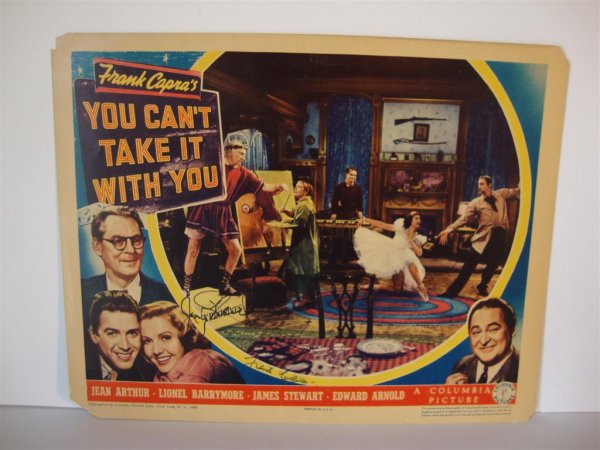 YOU CAN'T TAKE IT WITH YOU: 11" x 14" Arthur, Barrymore, Stewart, Arnold. (Columbia, 1938) Autographed by Jean Arthur and Frank Capra (Frank Capra smudged) Left upper and lower corner off as well as upper right image fine.