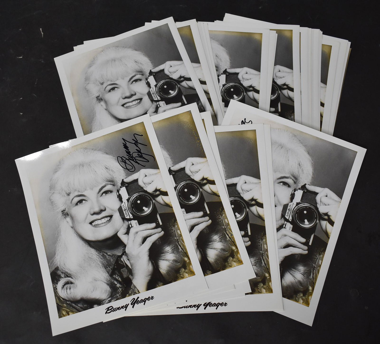 (38) Photos Of Bunny Yeager Holding Camera. (1 of 1)