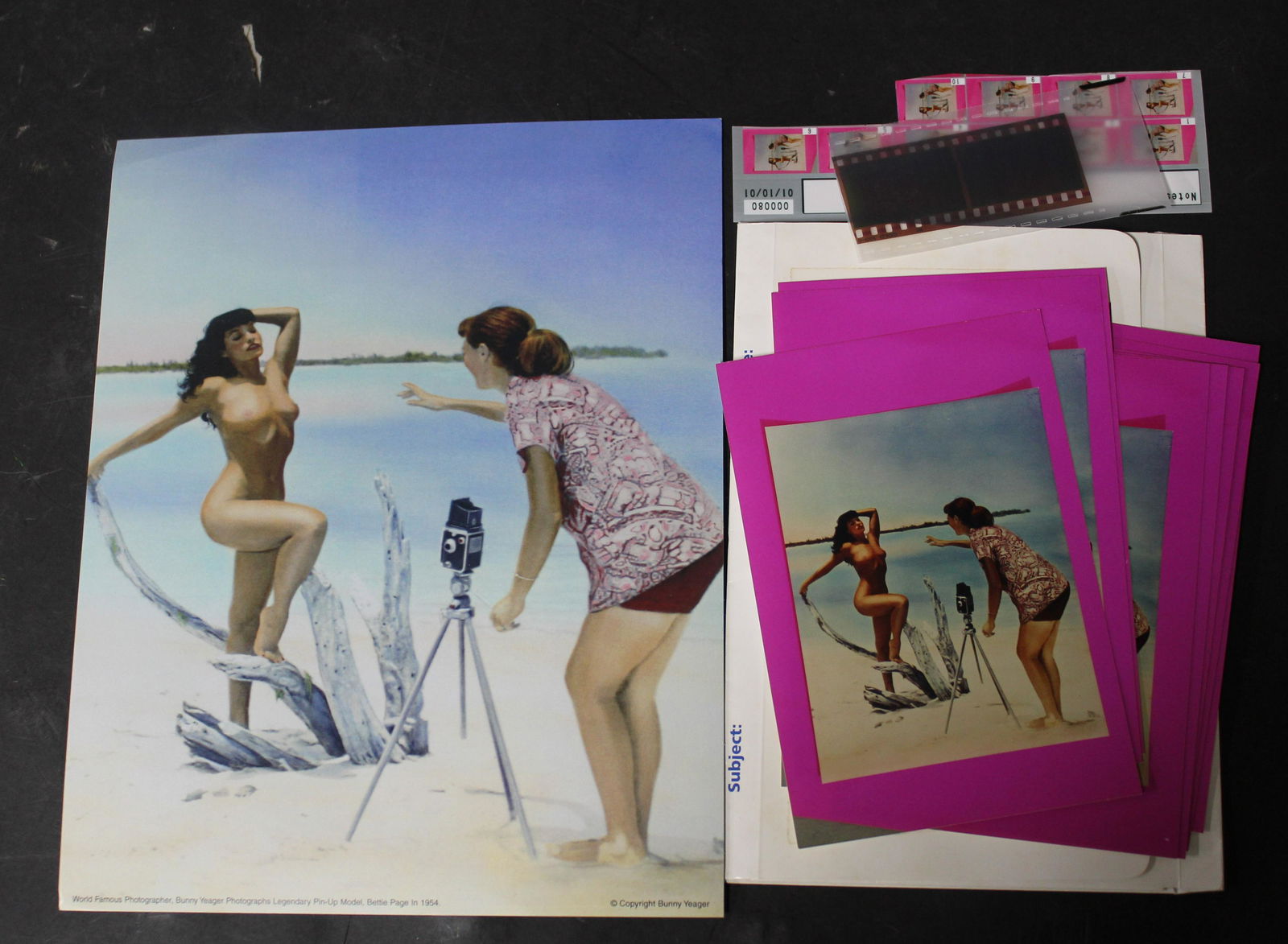 (8) 4x7 Photos Bunny Yeager & Bettie Page (1) 8x10 Of: (1) 8x10 Double Stock Photo With Bunny Yeager Lable on Back. &(8) 4x7 Photos Of Bunny Yeager Posing Bettie Page On Beach. & Negative Copies (10) Images