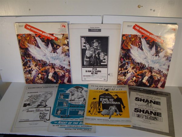 PRESS BOOKS & EXHIBITION CAMPAIGN MANUALS: "Emil and the Detectives"; "The Night of the Hunter"; "The Story on Page One"; "For A Few Dollars More"; "Shane"; "The Poseidon Adventure (2) Seven in the lot. Varying sizes. All uncut. (VF)