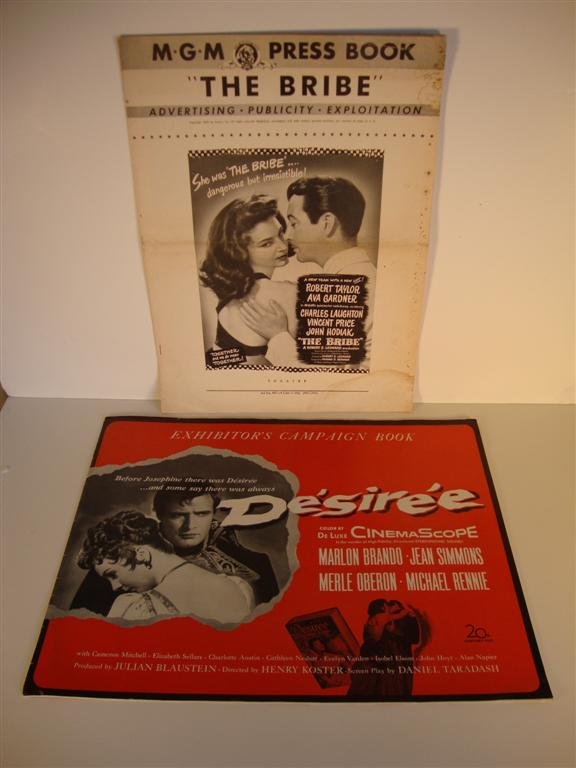 TWO PRESS BOOKS: (1)"The Bribe", MGM, 1949. TAYLOR, GARDNER. 12 pages, uncut.; (1) "Desiree" Campaign Book, 20th C. Fox, 1954. BRANDO, SIMMONS, OBERON. 28 pages, uncut. (VF-F)