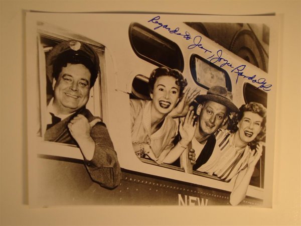 354 HONEYMOONERS PHOTOGRAPHED SIGNED: (1) Glossy photograph, The Honeymooners, Gleason, Randolph, Carney etc leaning out of the window of a bus. Signed Regards to Jean, Joyce Randolph in blue ink. NOTE THIS LOT WAS ALTERED AT NOON ON FEB.