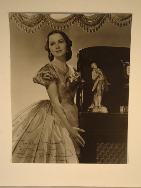 GONE WITH THE WIND SIGNED PHOTO: ISP, signed "To Gene Andrewski, All The Very Best, Olivia deHavilland, Melanie" 11" x 14" (VF)