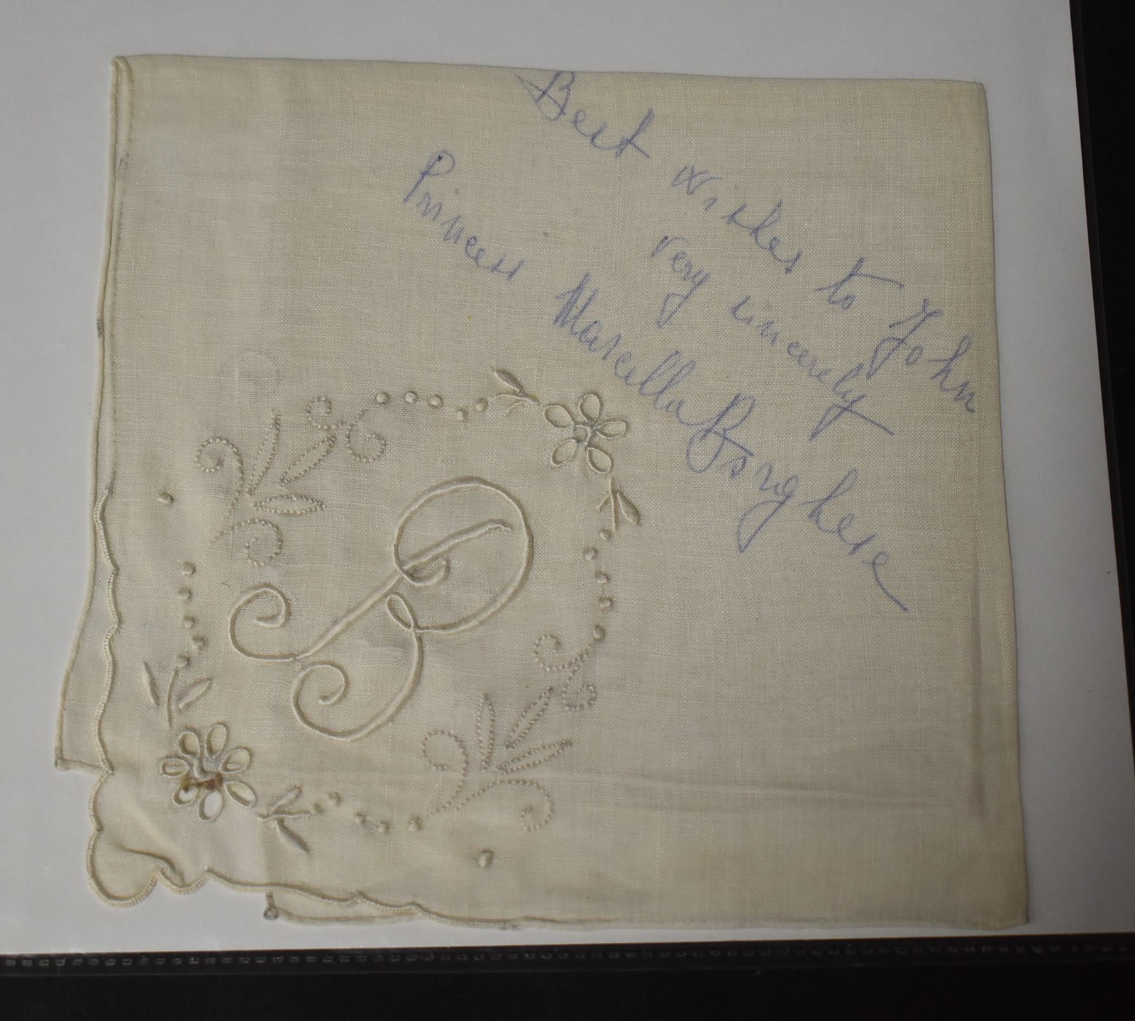 Princess Marcella Borghese Autograph: Signed in blue ink on a handkerchief.