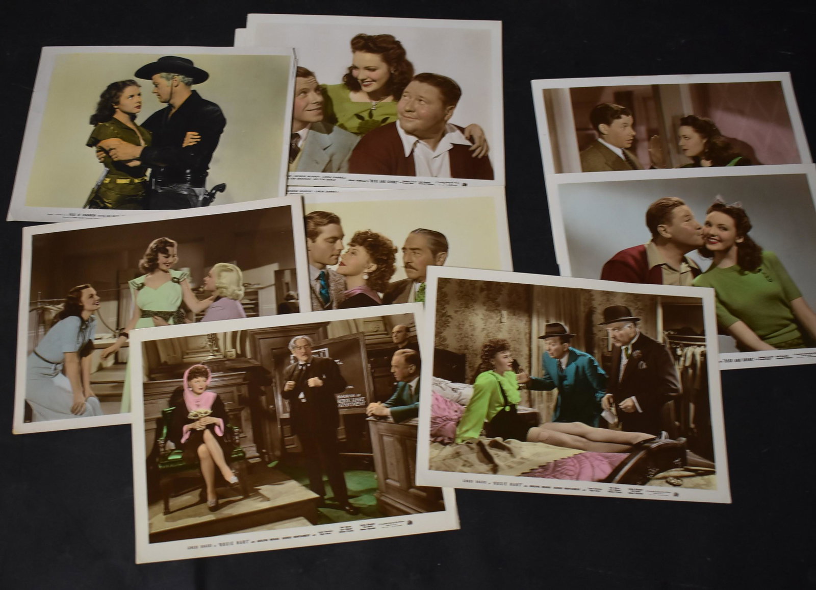 Movie Stills. "Rise and Shine", " Roxie Hart" & Others: Rise and Shine (4), Roxie Hart with Ginger Rogers (3). Included in the lot is Rose of Cimmaron and 1 other. All color. All 8 x 10. Nine in the lot.