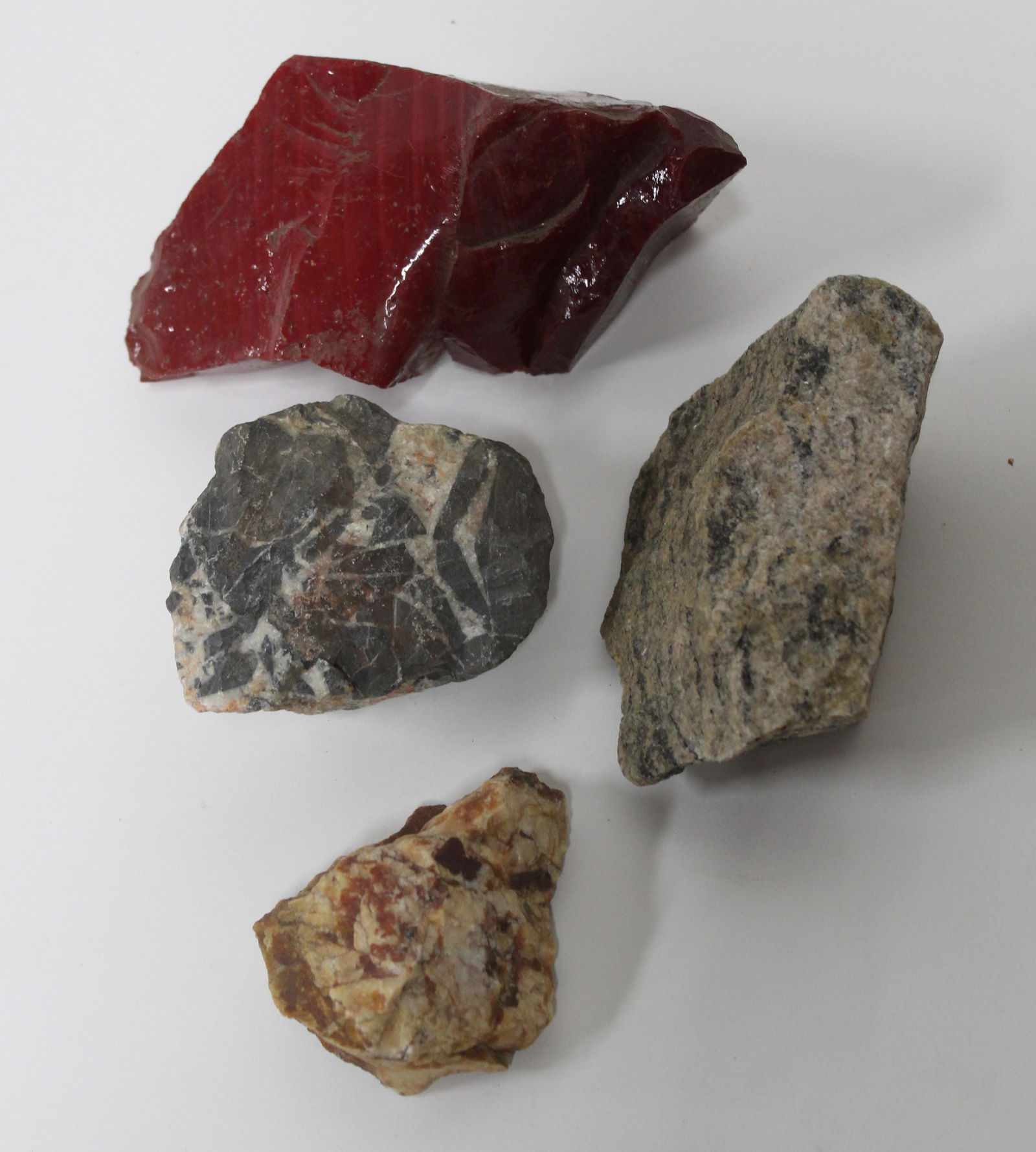 Lot of Rocks (4): Granite and possibly Red Calcite.