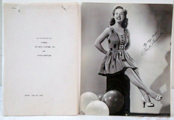 BONITA GRANVILLE SIGNED PHOTO AND CONTRACT: Ernest A. Bachrach RKO publicity photograph with back stamp for Bachrach and for RKO Pictures. With attached typed publicity snipe for Syncopation, 10 1/2x 13 1/2 Contract- Dated July 29, 1941. 32 pg 
