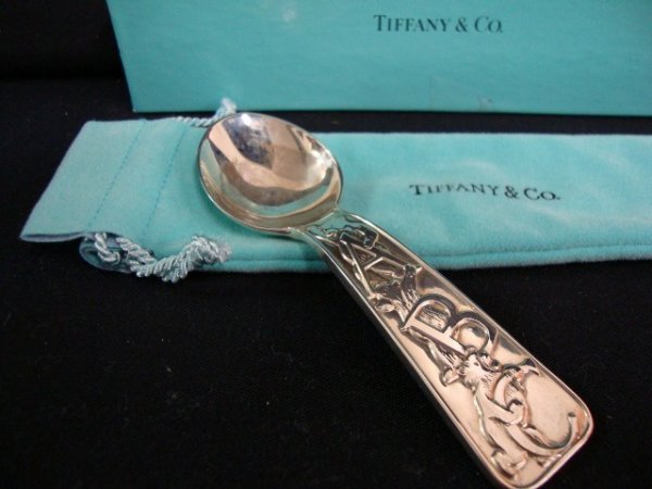 TIFFANY & CO. STERLING BABY SPOON: Tiffany & Co. sterling silver baby spoon with ABC & playful bears on handle. In original blue bag and box (box "as is") 4" long