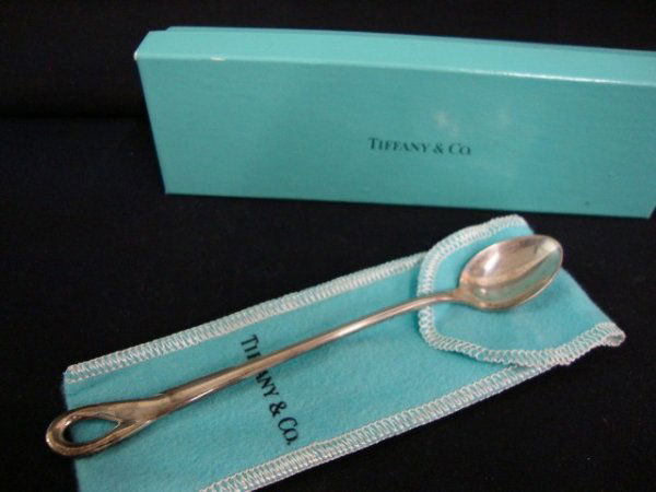 TIFFANY & CO. STERLING BABY SPOON, PERETTI: Tiffany & Co. sterling silver baby spoon. Padora pattern by Elsa Peretti. In original blue bag and box.