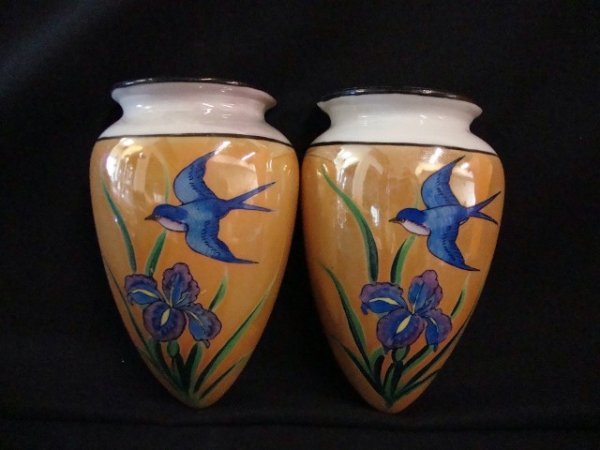 TWO HAND PAINTED JAPANESE WALL POCKETS: Two Japanese hand painted wall pockets with bluebird and Iris decorations. On irredescent porcelain glaze. 6-3/4" h
