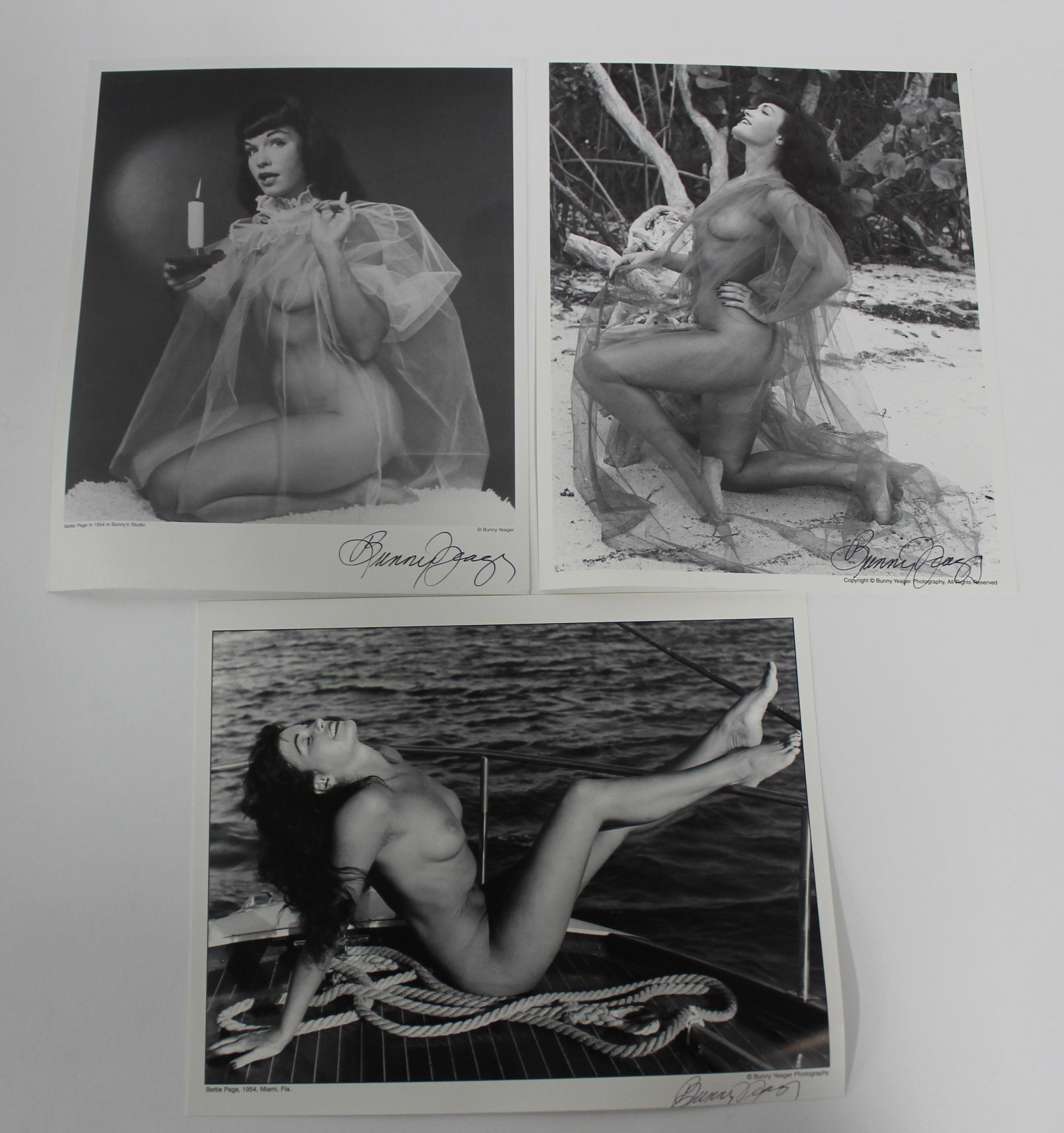 (3) Betty Page Photos. Sgd.: 8x10 Double Stock. (3) Photos of Bettie Page All Sgd. Bunny Yeager.