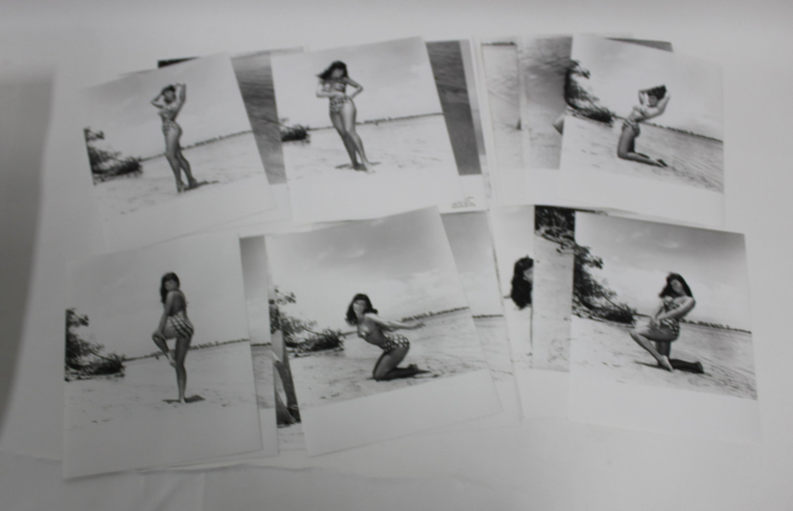 (18) Bettie Page Photos: 8x10 Double Stock. (18) Photos Bettie Page In Bikini All Different Poses.