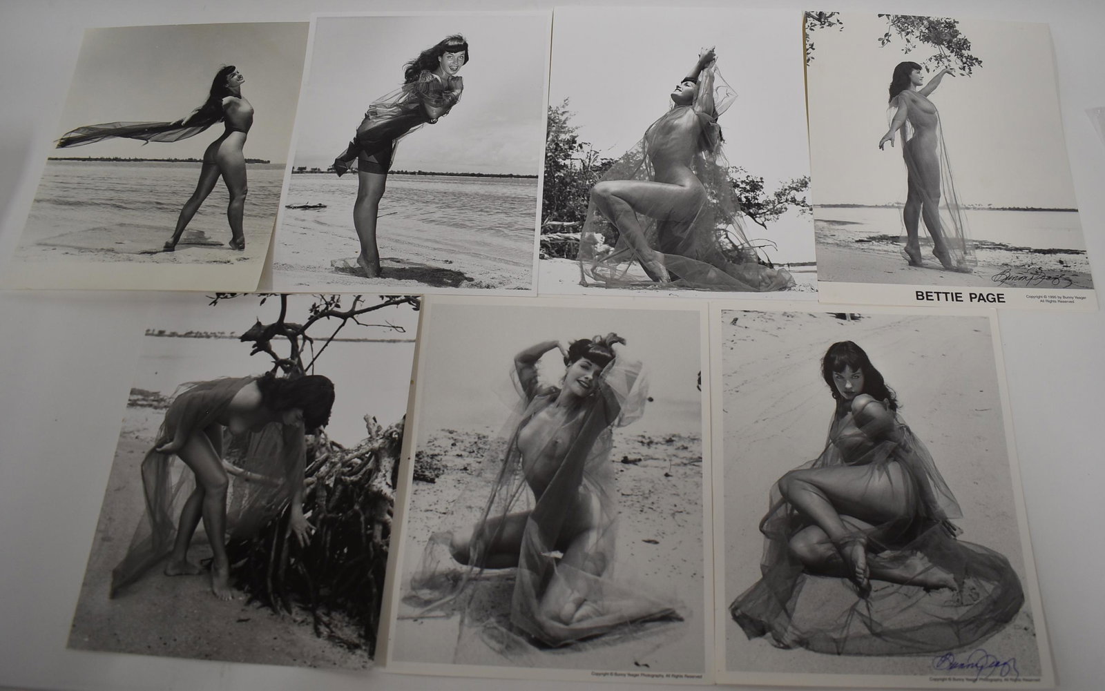 (7) Photos Bettie Page (2) Sgd.: 8x10 Double Stock. All Different Poses. (2) Sgd. Bunny Yeager.