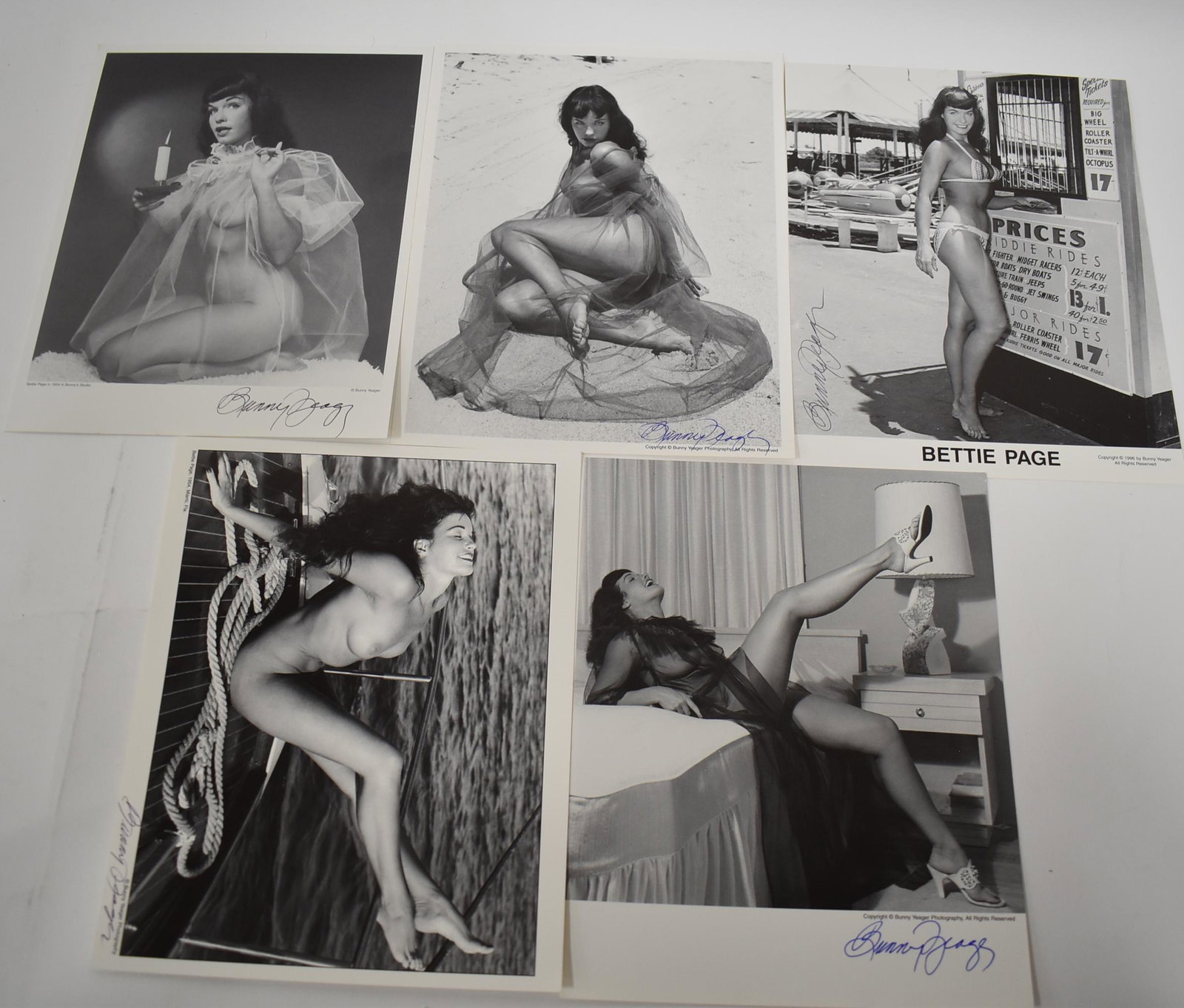 (5) Photos Bettie Page. All Sgd.: 8x10 (5) Photos Bettie Page. All Different Poses, All Sgd. Bunny Yeager.
