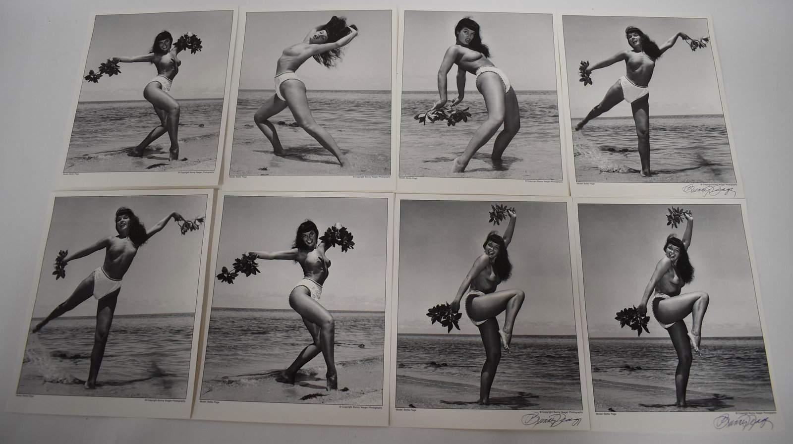 (50) + Photos Bettie Page . (3) Sgd.: 8x10 (50) + Photos Bettie Page Dancing on Beach. (8) Different Poses. (3) Sgd. Bunny Yeager.