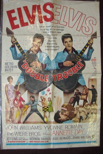 TWO ELVIS PRESLEY MOVIE POSTERS: Double Trouble, MGM, 1967 & Harum Scarum, MGM, 1968. Both 27 x 41, folded