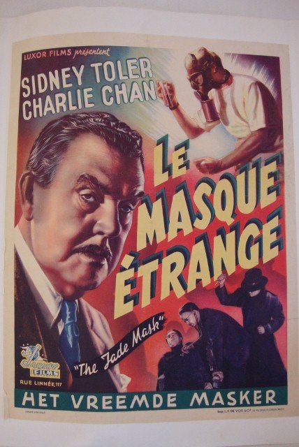 THE JADE MASK MOVIE POSTER - BELGIAN VERSION: Le Masque E'Trance. Luxor Films, 1945. Sidney Toler, Moreland. Belgian version. Linen backed. 14 x 19