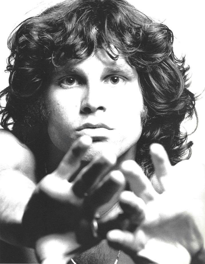 Jim Morrison Joel Brodsky Publication Photo: Original Publication Photo, measuring approximately, 10.5"x8.5" includes white border. Taken in 1966, printed 1998. It comes stamped by the photographer and agency. The photograph is printed on double