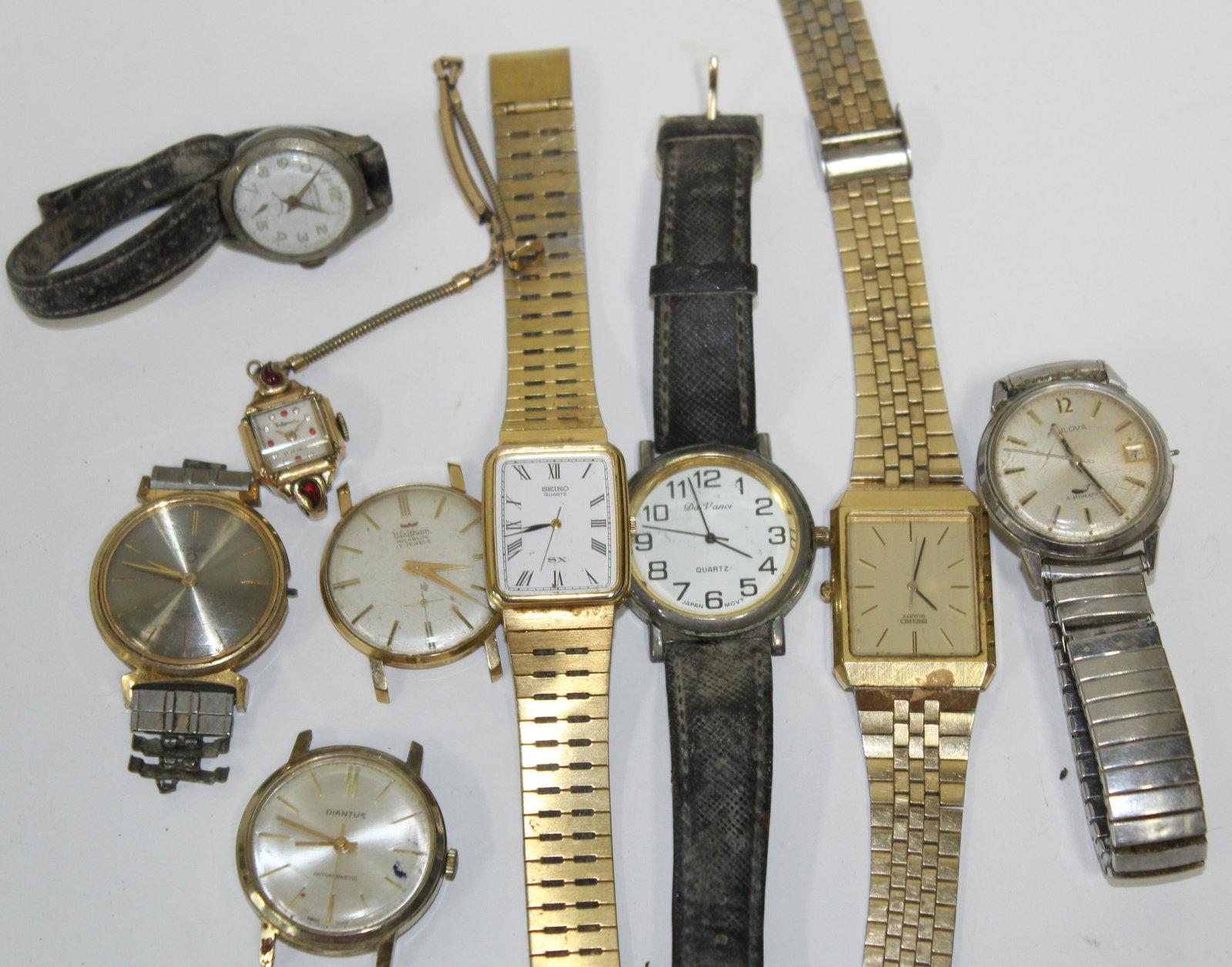 Lot of Vintage Watches (9): Some without bands. Includes seiko (2), Le Salle, Diantus, Bulova, Norman de Lux , Da Vinci, Waltham and 1 jeweled womens watch.