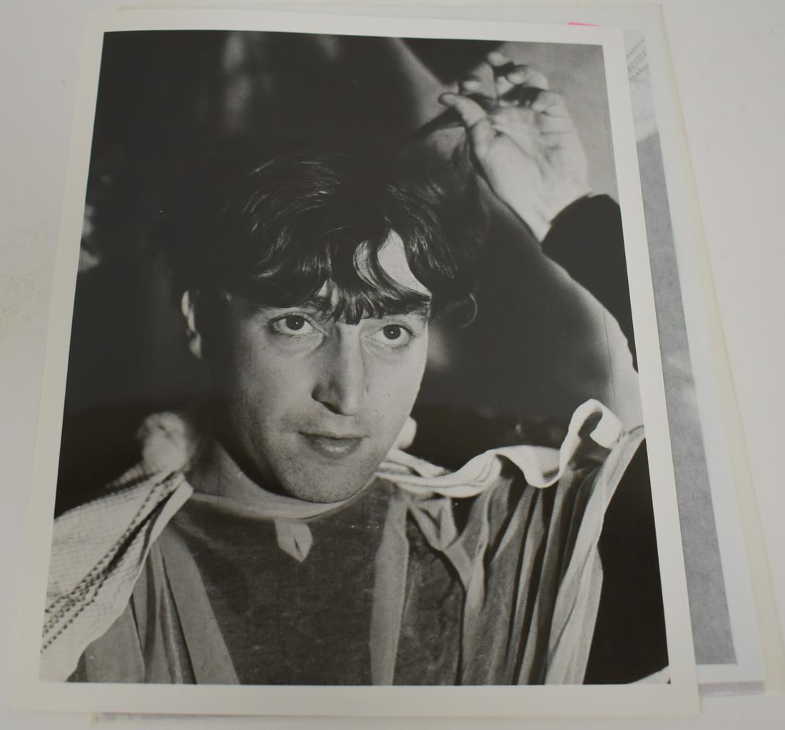 John Lennon Photos and Negative (3): Two identical photos and the negative from which they were made. 8 x 10.