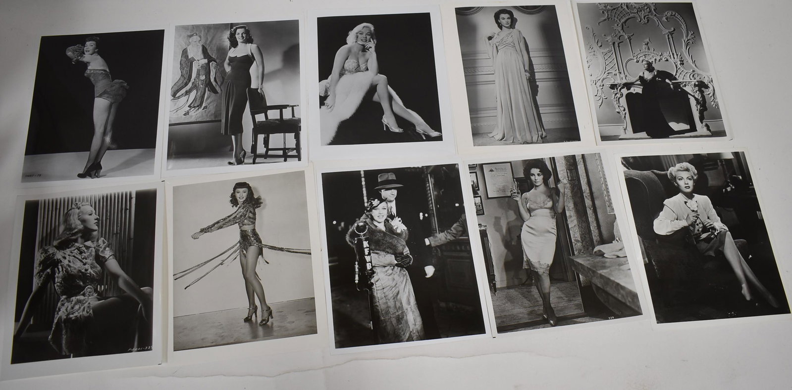 Collector's Lot of Hollywood Glamour Girls Photographs: Betty Grable, Jane Wyman, Barbara Stanwyck, Jane Russell, Jane Mansfield, Ginger Rogers, Vivian Leigh, Elizabeth Taylor, Lana Turner, and one unidentified. All 8 x 10.