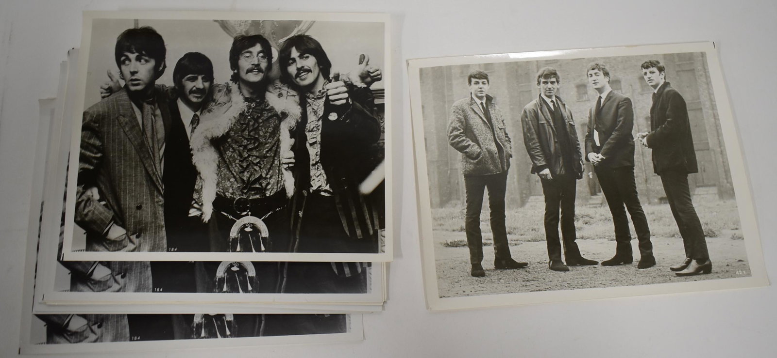 Collector's Lot of Beatles Photographs (14): One single image, and 13 the same. 8 x 10.