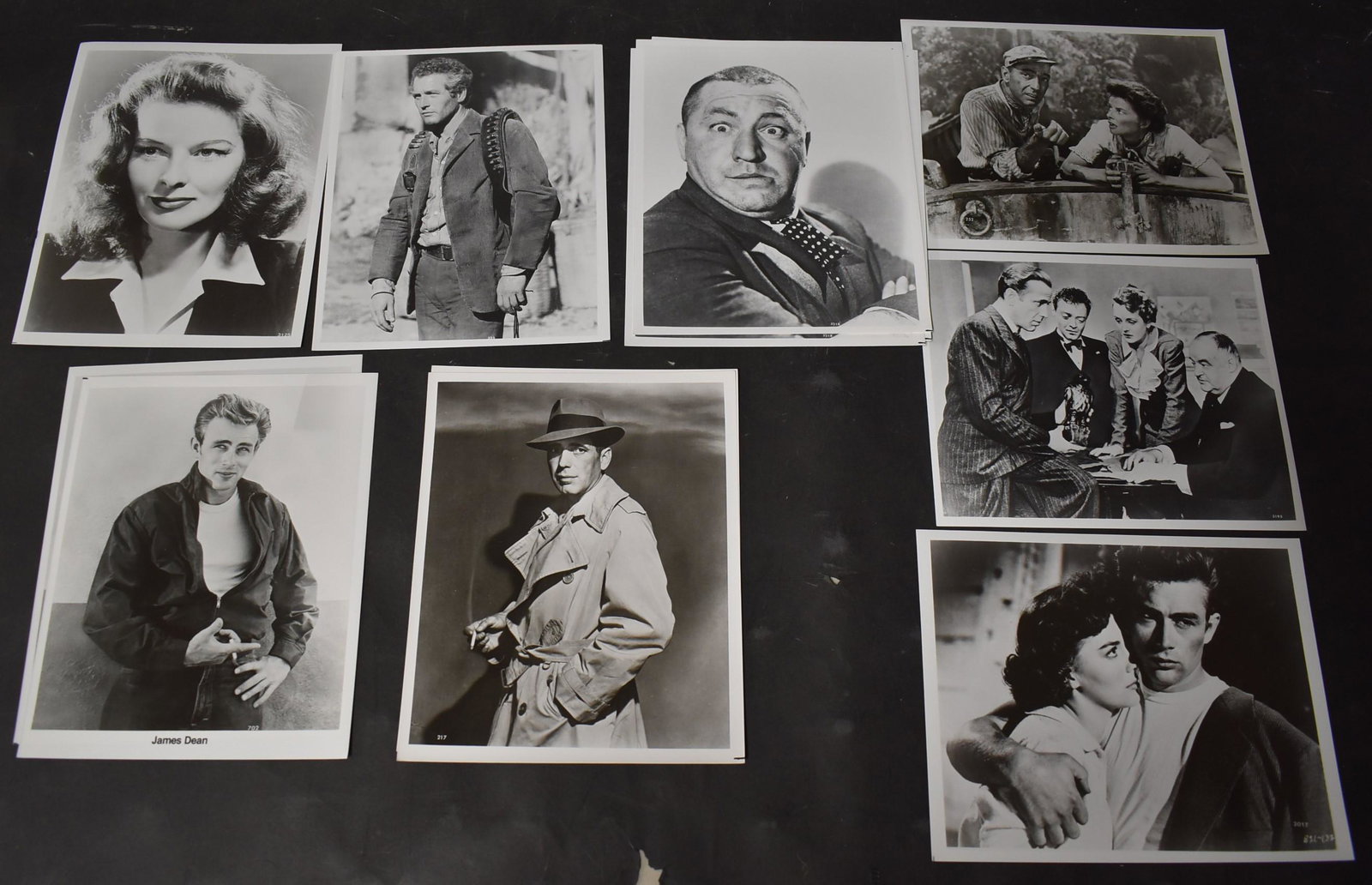Iconic Hollywood Photos (12): Kathryn Hepburn, James Dean (2), Dean with Natalie Wood, Humphrey Bogart (2), Bogart with Hepburn, Bogart in the Falcon, Paul Newman, Curly Howard (3). All 8 x 10.