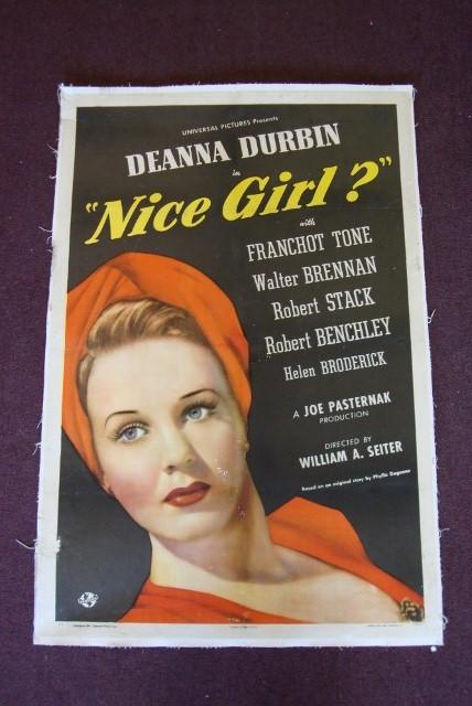 NICE GIRL? DEANNA DURBIN MOVIE POSTER: Universal, 1941. Linen backed. Durbin, Tone, Stack. 27 x 41. F (spots on cheek probably visible in photo)