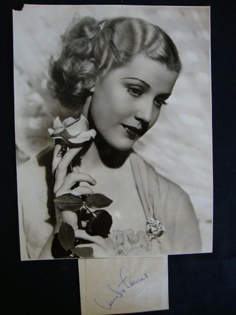 ANITA LOUISE PHOTOGRAPH - ELMER FRYER: Reverse backstamp, "Photograph by Elmer Fryer, Warner Bros., - F.N Studios", et al. In pencil, "Anita Louise in A Midsummer Night's Dream" (upper left corner small tear) together with a cut autograph.