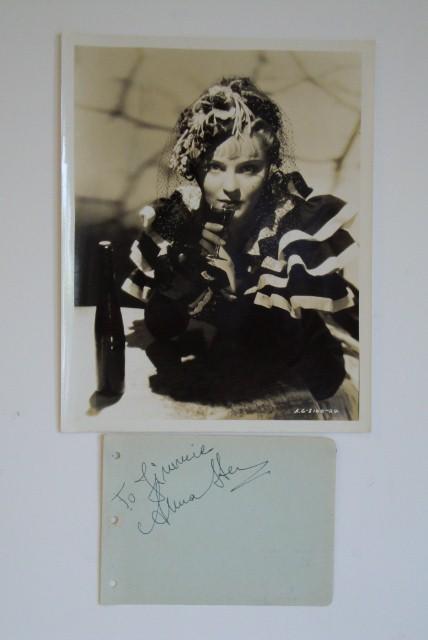ANNA STEN PHOTOGRAPH & AUTOGRAPH: 8 x 10 glossy publicity of Anna Sten in Nana. United Artists, 1934. Autograph in blue ink on a 4 x 6 album page.