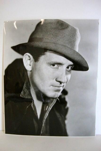 SPENCER TRACY MOVIE STILLS - 30's & 40's: c/u publicity portrait (1); Up The River, 1930, scene (1); Six Cylinder Love, 1931, c/u portrait (1); Goldie, 1931, c/u scene with Harlow, "after the fight" scene and another (3); Sky Devils, 1932, c/