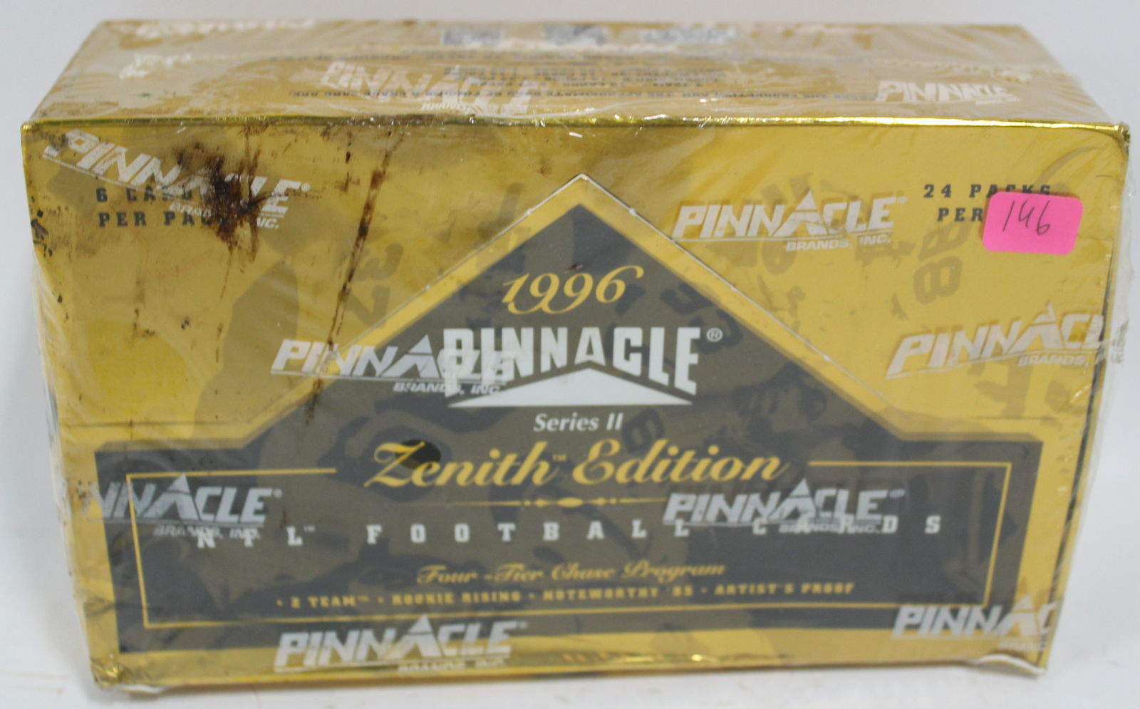 1996 Pinnacle Zenith Ed. NFL Card Box: Unopened box with 24 packs of 6 cards each for an approx total of 144 cards. Some wear to box.