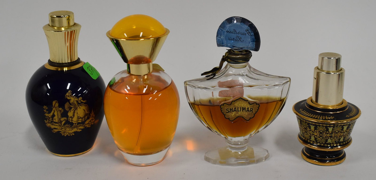 Perfume Bottles (4): (1) Limoges, (1) Guerlain Paris,(1) Avon, (1) Venus Perfume Greek