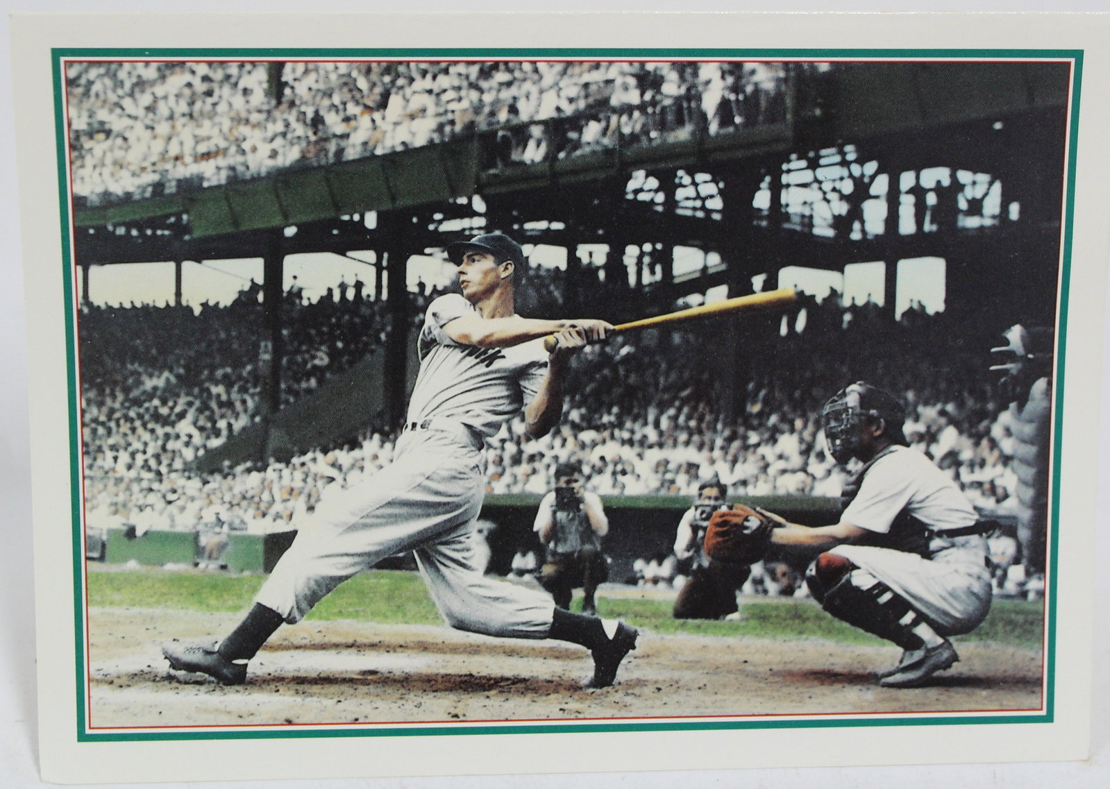 Score Mickey Mantle Greeting Card: Advertisement greeting card depicting Mickey Mantle hitting a double during his famed 56-game hitting streak. Minor stain on the inside of the card. 5 in x7in.